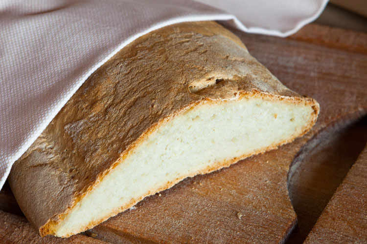 The shape of Tuscan bread is round, rectangular or ovoidal.